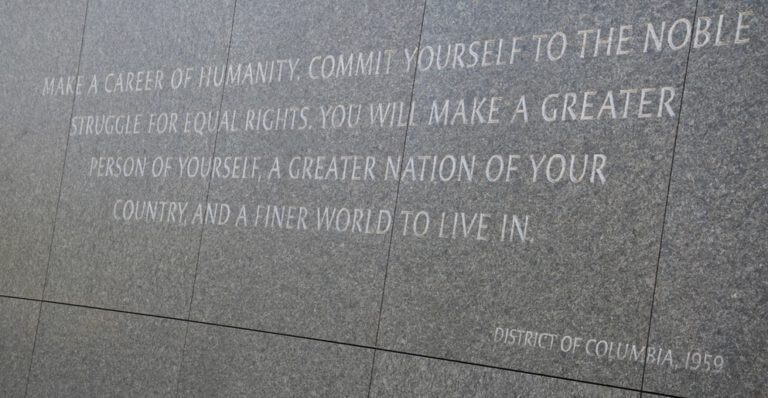 Dr. Martin Luther King Jr. Monument, grey stone with quote inscribed 'Make a career of humanity, commit yourself to the noble struggle for equal rights, you will make a greater person of yourself, a greater nation of your country, and a finer world to live in'